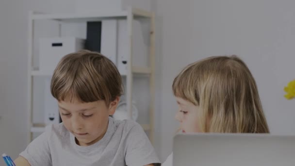 Boy Years Old Helps His Younger Sister Make Her Homework — Video Stock