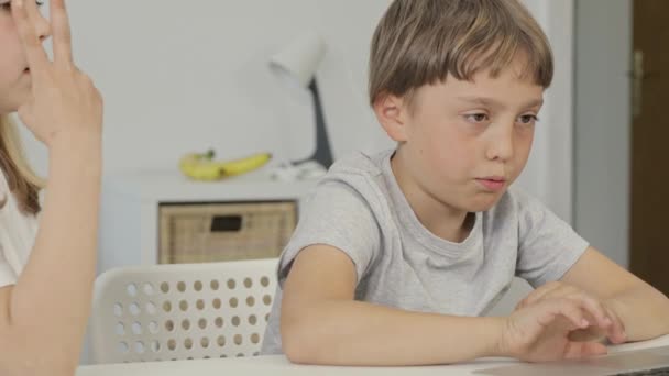 Boy Years Old Helps His Younger Sister Make Her Homework — Stock video