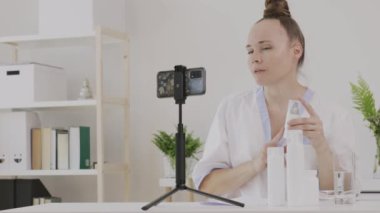 Female cosmetologist is giving online consultation. 