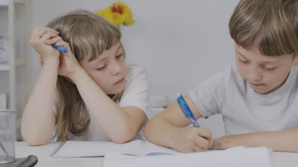 Boy Years Old Helps His Younger Sister Make Her Homework — Wideo stockowe
