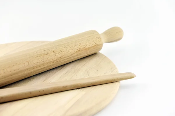 Wooden rolling pin and breadboard — Stock Photo, Image