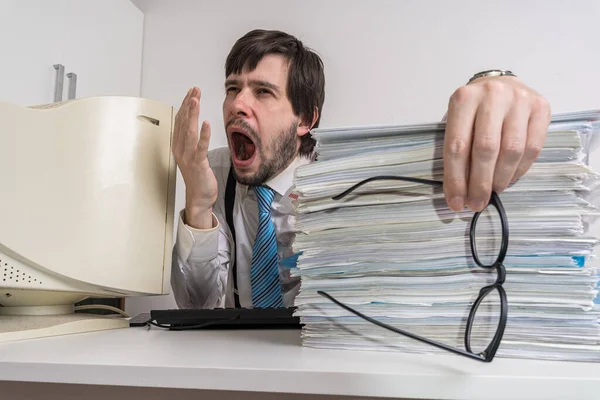Tired Yawning Man Office Many Documents Desk — Foto de Stock