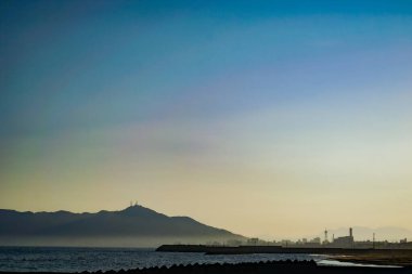 Hakodate Dağı ve Hakodate 'nin akşam manzarası. Çekim Konumu: Hokkaido Hakodate Şehri
