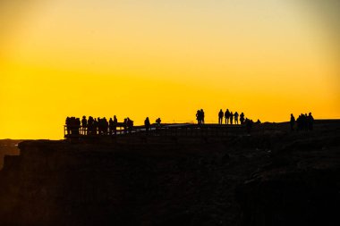 Gotorphoss morning and people silhouette. Shooting Location: Iceland