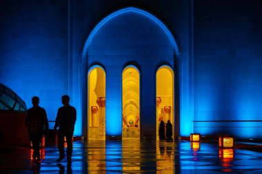 Shaking Id Mosque and People Silhouette (Abu Dhabi UAE). Shooting Location: Abdabi