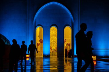 Shaking Id Mosque and People Silhouette (Abu Dhabi UAE). Shooting Location: Abdabi