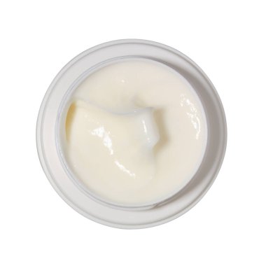 Beyaz kaptaki beyaz kozmetik krem örneğini kapat.