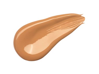 Beyaz arka planda kremalı bir temel var. İzole edilmiş. Güzellik ve moda anlayışı