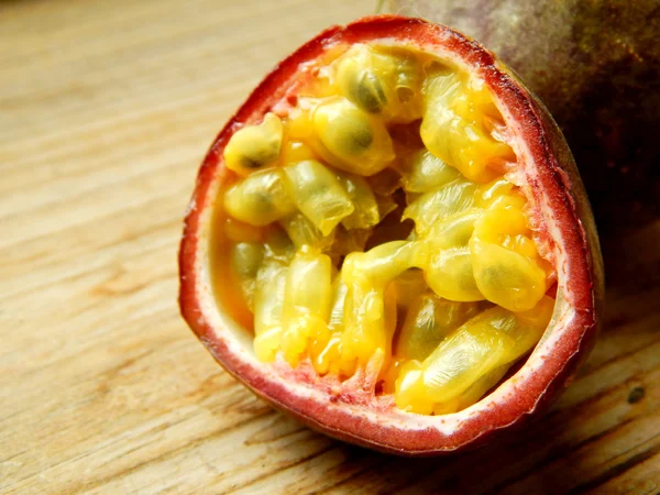 Passionfruit on a wooden table — Stock Photo, Image