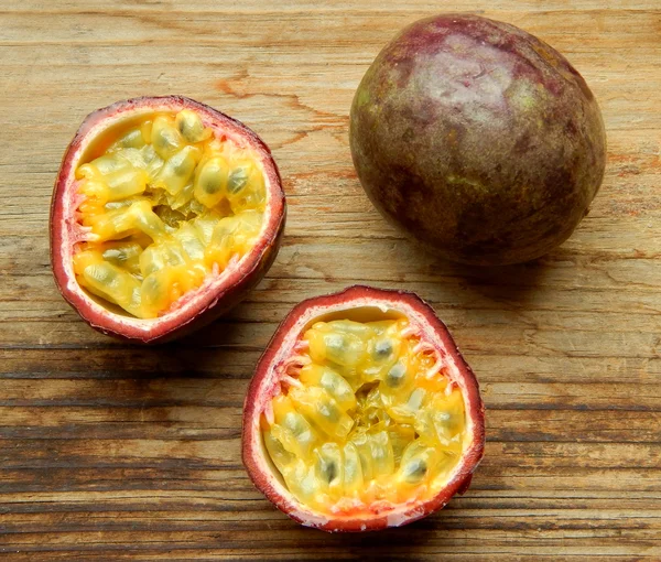 Passionfruit on a wooden table — Stock Photo, Image