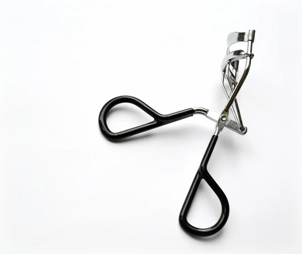 A black eyelash curler isolated on white — Stock Photo, Image