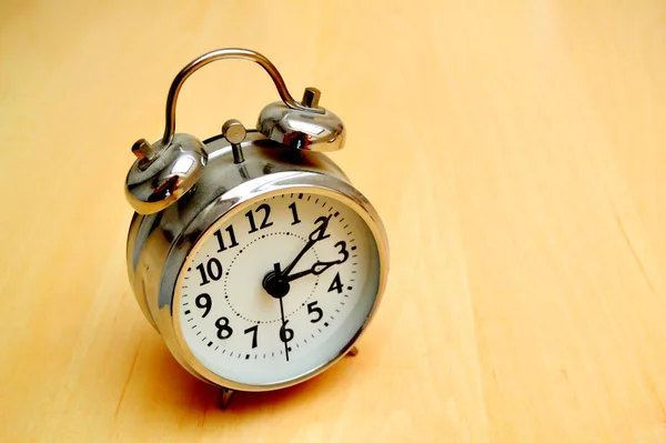 Old fashioned metallic alarm clock — Stock Photo, Image