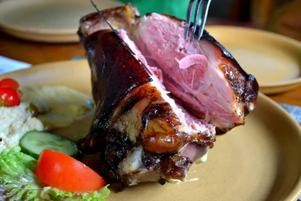 Traditional czech dish - grilled pork knee