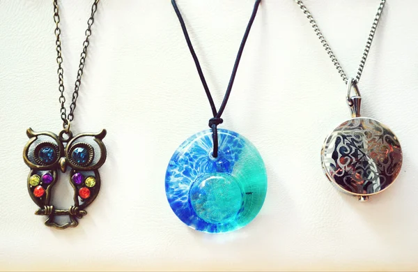 Three beautiful necklaces with precious gems — Stock Photo, Image