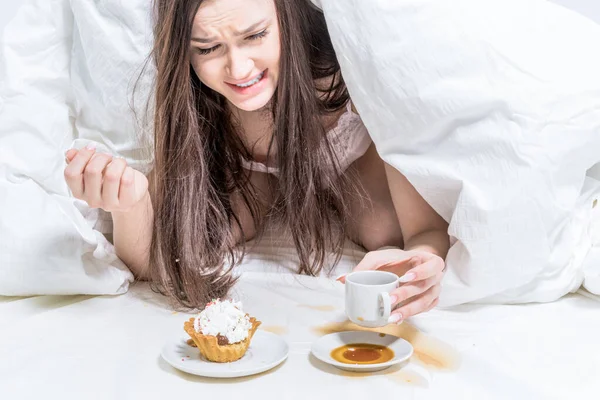 Girl Upset Spilled Coffee Bed Brunette Lies Bed Next Her Stock Image