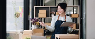 Small Entrepreneurs Start A Home Business By Arranging Goods With Brown Parcel Boxes, Small Home Business Startup Ideas