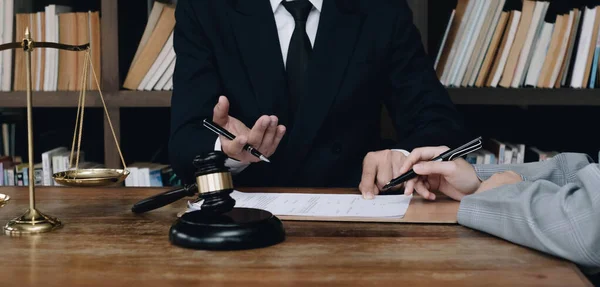 Group of business people and lawyers discussing contract papers ,Consultation between a male lawyer and businessman concep