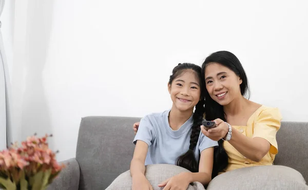Happy Asian Parents Sit Comfortable Couch Living Room Little Kids — 스톡 사진