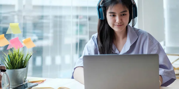 Homeschool Caucasian cute young girl student learning virtual internet online class from school teacher by remote meeting due to covid pandemic. Male teacher teaching math calculus by using whiteboar