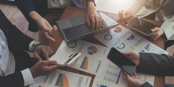 Business adviser analyzing financial figures denoting the progress in the work of the compan
