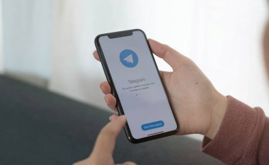 CHIANG MAI, THAILAND JUL 28 2022 : Telegram application icon on Apple iPhone Xs screen close-up. Telegram app icon. Telegram is an online social media network. Social media ap