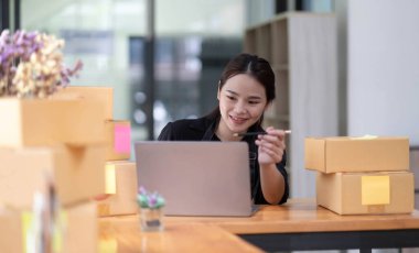 Asian Young entrepreneur, teenager SME business owner work at home, alpha generation life style, SME online business conceptua