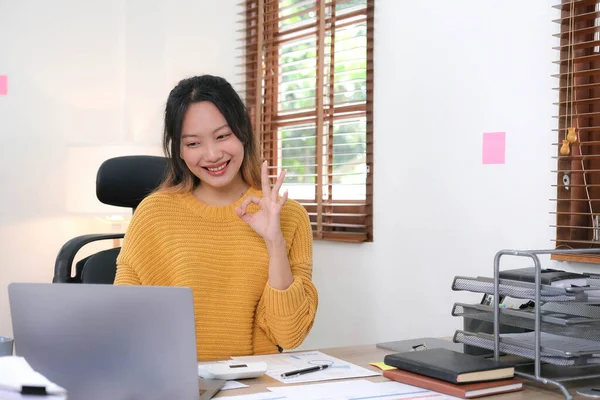 Online video conference and Digital meeting. Business woman discussing business with team by video conference in home office..