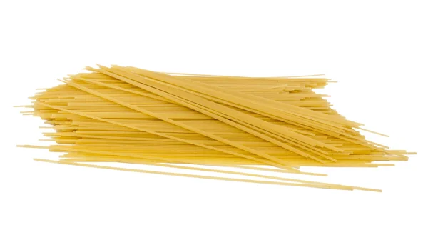 Uncooked spaghetti on a white background — Stock Photo, Image