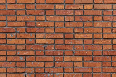 Duvar, beton harçla tutturulmuş kırmızı tuğladan yapılmış. Tuğla işçiliğinin arkaplan resmi