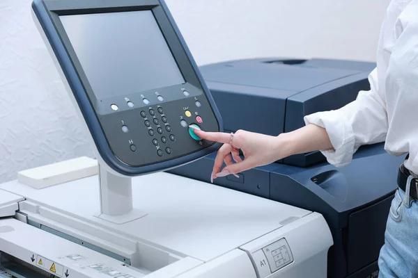 Woman printing documents in typography