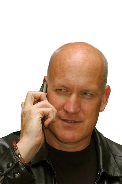 Man pratar på en mobiltelefon Stockfoto