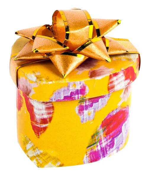 Sarı bir kutu ve beyaz arka plan üzerinde şerit — Stok fotoğraf