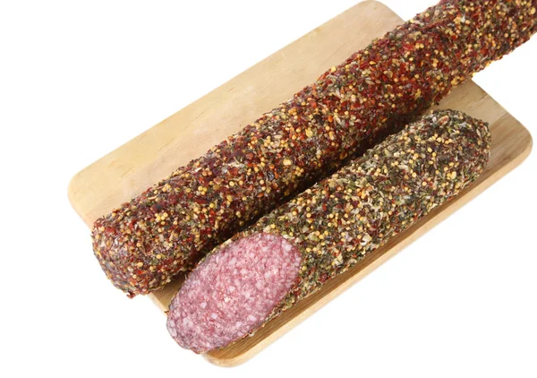 Salami on cutting board Stock Image