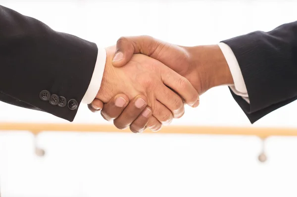 Sealing a deal. Close-up of business men shaking hands — Stock Photo, Image