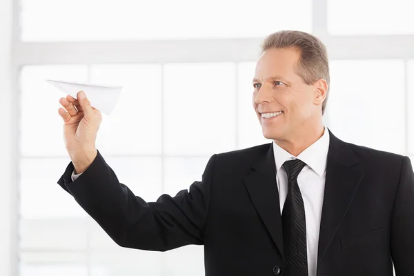 Businessman with airplane — Stock Photo, Image