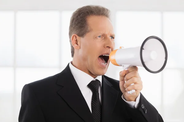 Homem de negócios com megafone — Fotografia de Stock