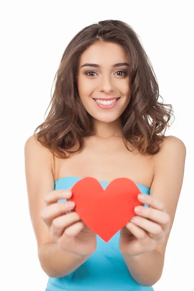 Young woman holding a red paper heart — Stock Photo, Image