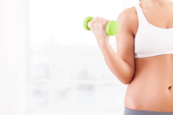 Exercising with dumbbells. — Stock Photo, Image