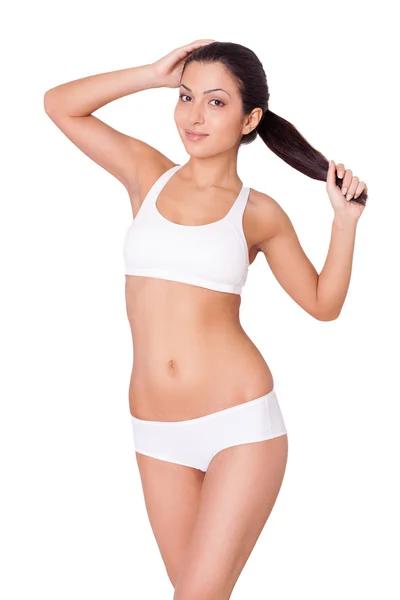 Attractive young Indian woman in white bra and panties — Stock Photo, Image