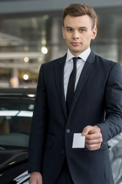 Man with business card. — Stock Photo, Image