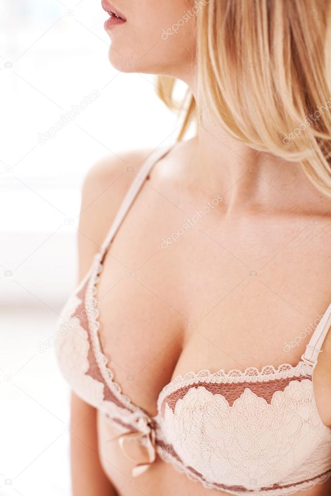 Beautiful young woman in bra