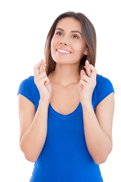 Woman keeping fingers crossed — Stock Photo, Image