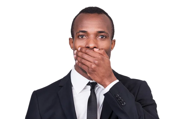 African man covering his mouth — Stock Photo, Image