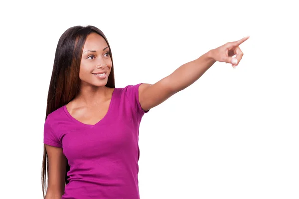 African woman pointing away — Stock Photo, Image