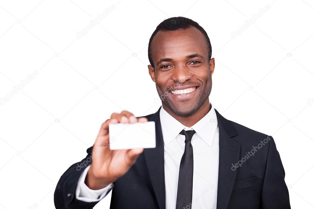 African man showing his business card