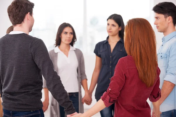 Group of people standing in circle — Stock Photo, Image