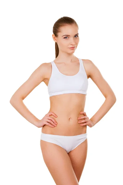 Woman in white bra and panties holding hands on hip — Stock Photo, Image