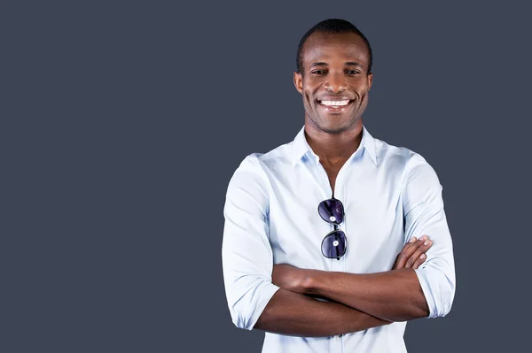 Black man keeping arms crossed — Stock Photo, Image