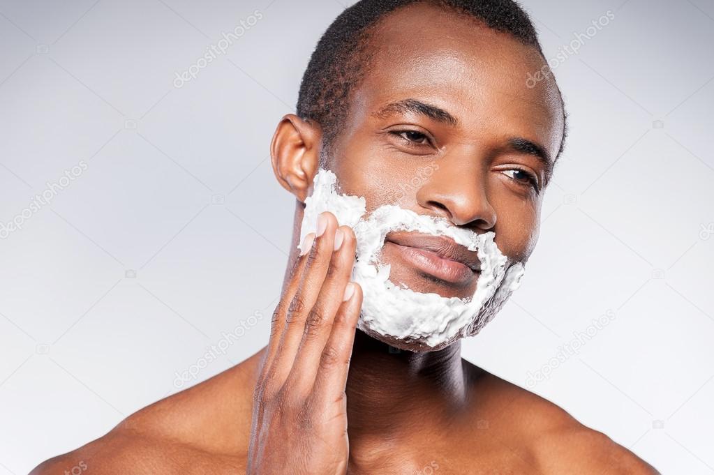 Applying cream on face.