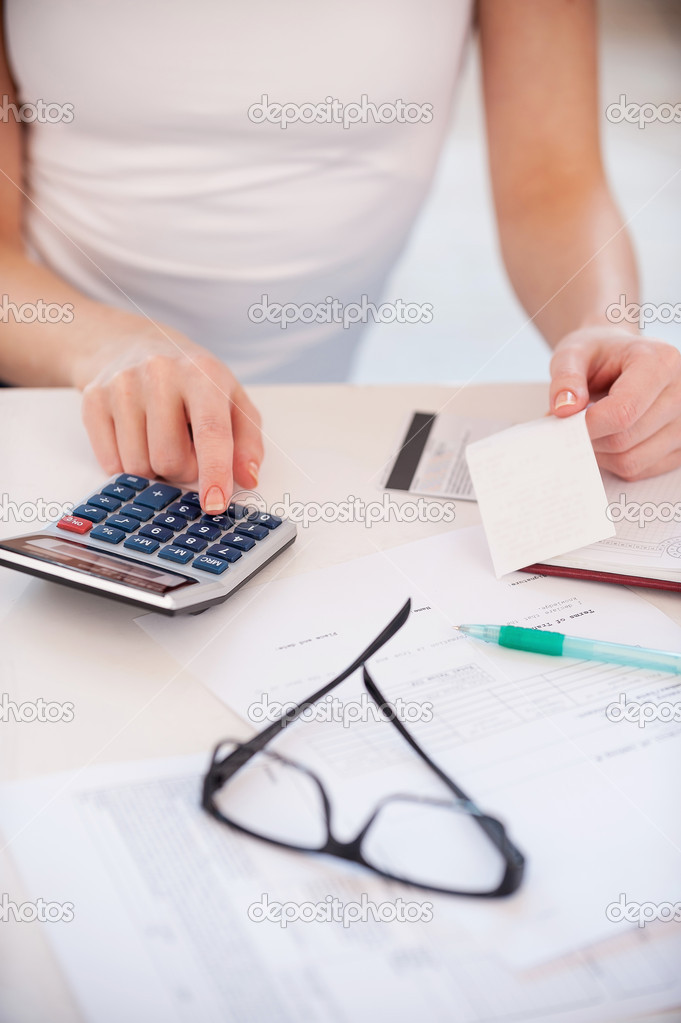 Calculating expenses.